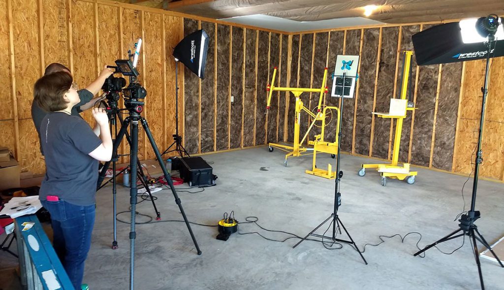 Video and photo shoot of sheetrock installation equipment.