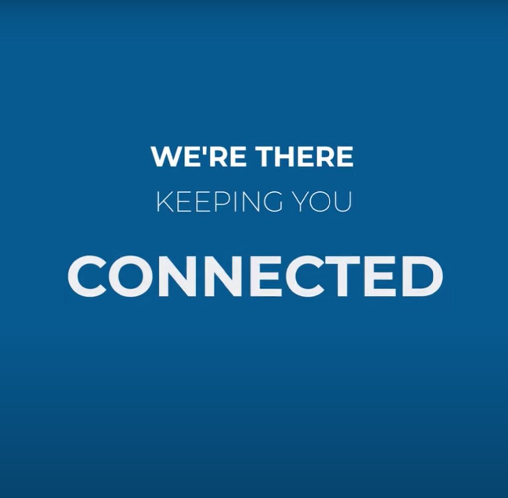 Blue background with white text that reads 'We're Keeping You Connected"