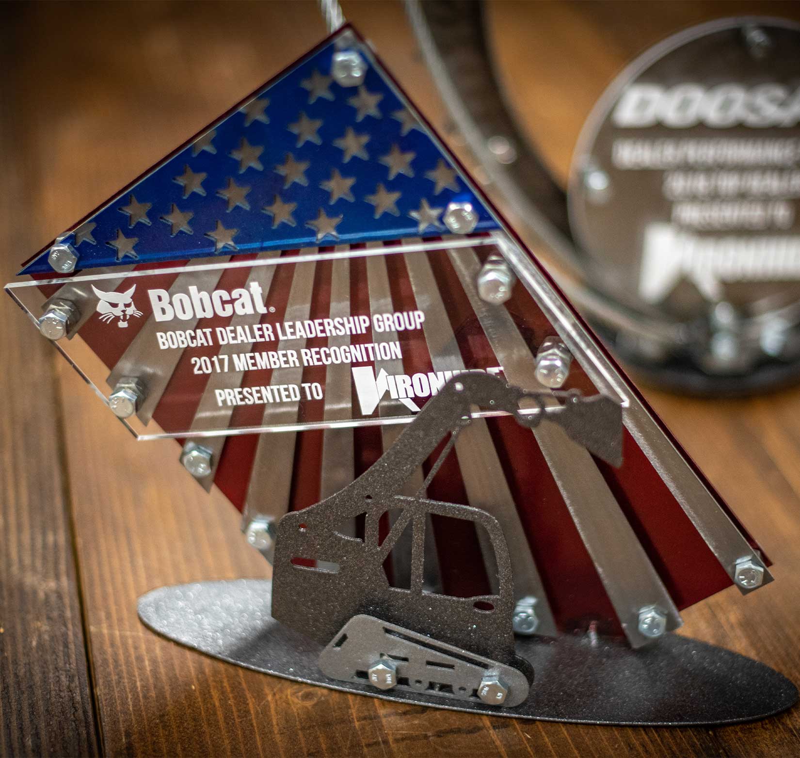 A three-dimensional metal and plastic award created for Ironhide Equipment.